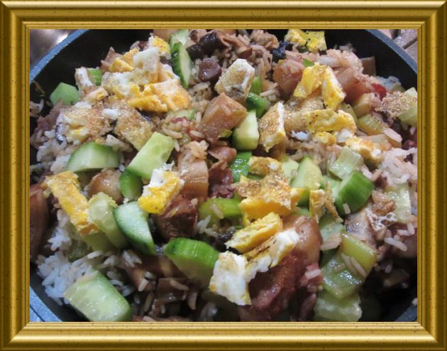 Asiatischer Reis mit Schweinebauch aus dem Wok aus der Taraland Lehrküche